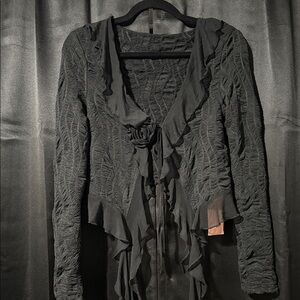 Elegant Black Ruffled Blouse With Rose Detail